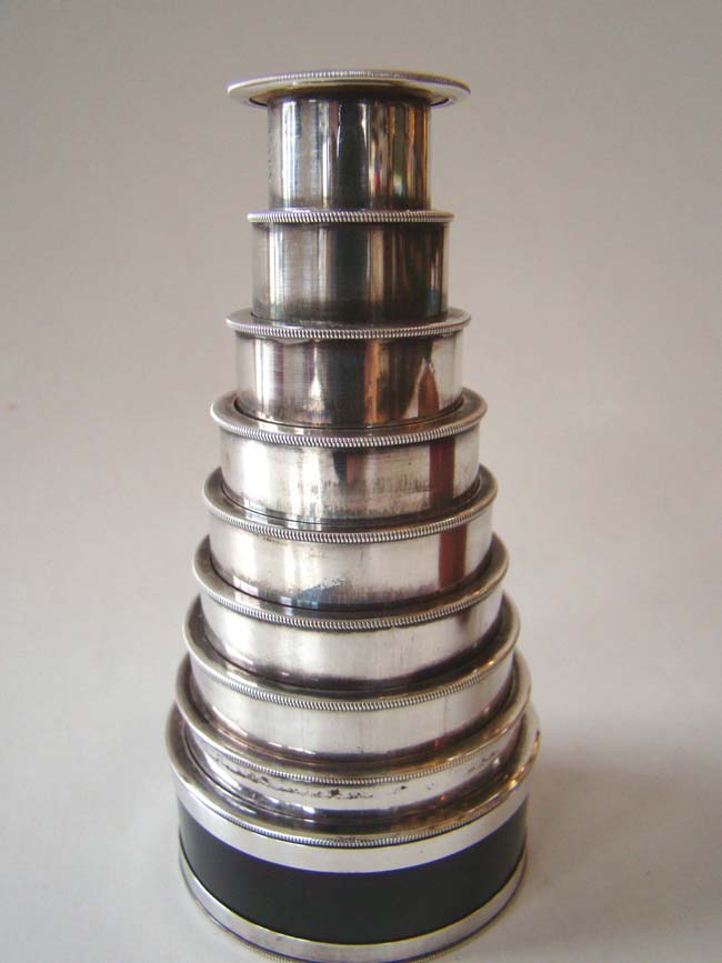 A wonderful silver plated 8 draw Monocular signed 'Carey, London' circa 1800